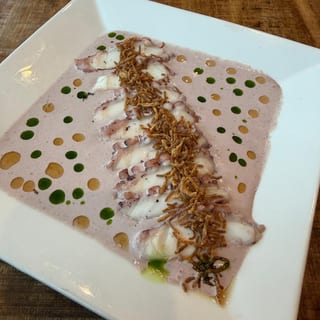 Tiradito de Pulpo al Olivo con Camote Frito
