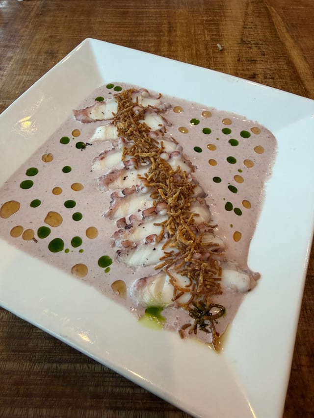 Tiradito de Pulpo al Olivo con Camote Frito